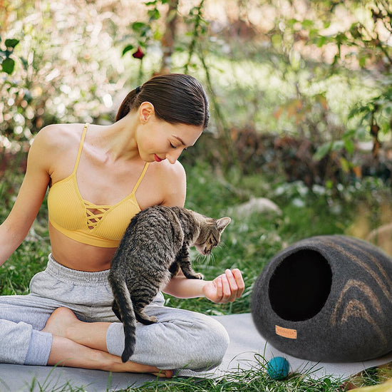 a woman chill with her cat 